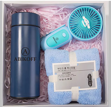 Vacuum cup, fan, and towel gift set